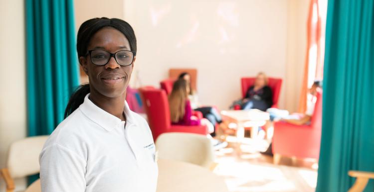 Healthwatch volunteer smiling at the camera